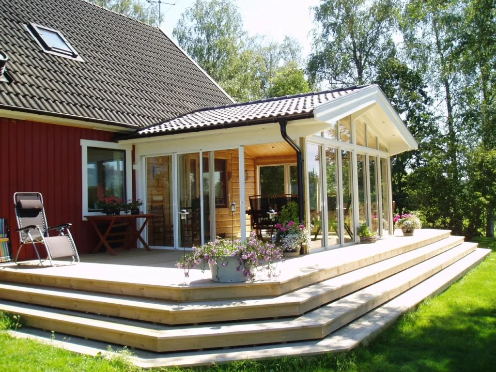 7. Fasadma╠elning av hus med ta╠eckfa╠erg